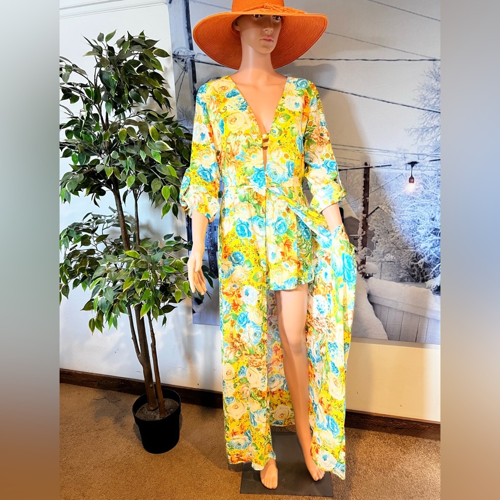 Xtaren Long sleeve floral romper size Large.